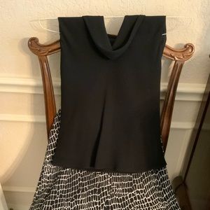 A sleeveless 2 piece outfit for hot temperatures at work or an evening out.
